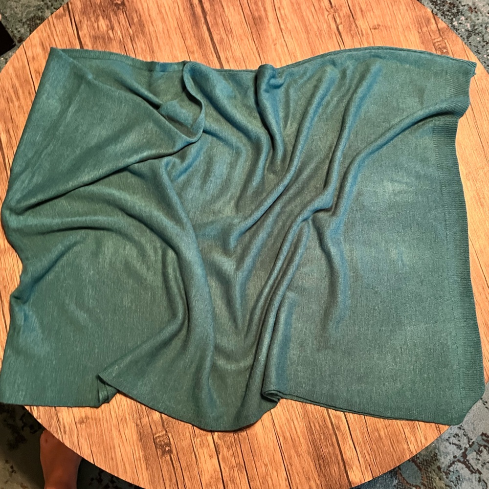Asymmetric poncho in a gorgeous green color